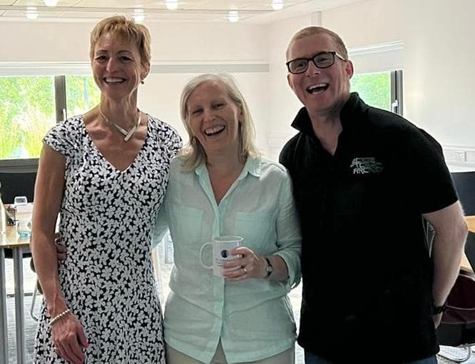 Collaboration Global members laughing together